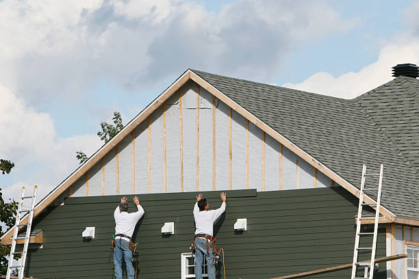Professional Siding Installation technician working in Smithton, PA